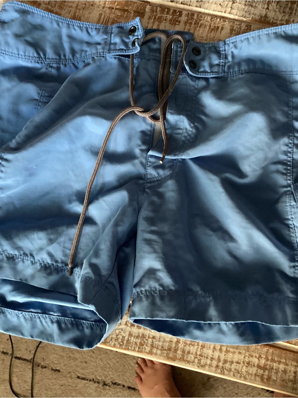 The North Face Light Blue Swim Shorts with Floral Waistband